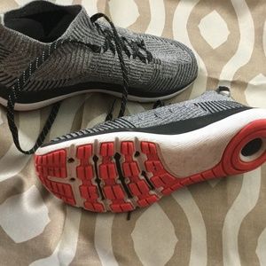 Under armor run I will strong ,grey and black  size 7.5